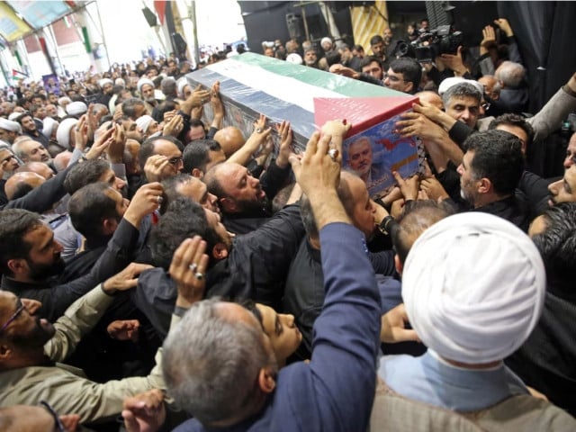 mourners carry the coffin of assassinated hamas chief ismail haniyeh during his funeral ceremony in tehran iran august 1 2024 office of the iranian supreme leader wana west asia news agency photo reuters